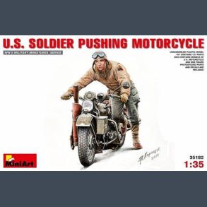 U.S. SOLDIER PUSHING MOTORCYCLE