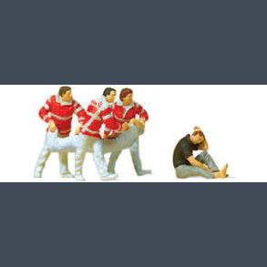 Paramedics with rescue sheet, injured persons