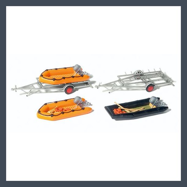 3 rubber dinghys and 2 trailers